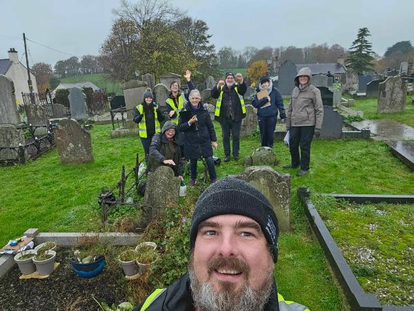 A community group undertaking a survey in the graveyard of Kilmore church